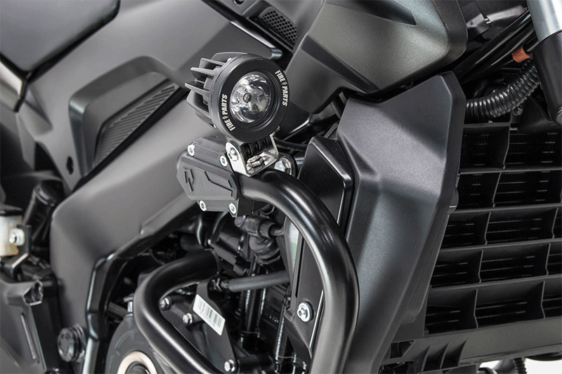 Defensa con luces auxiliares