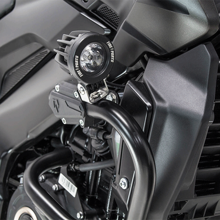 Defensa con luces auxiliares