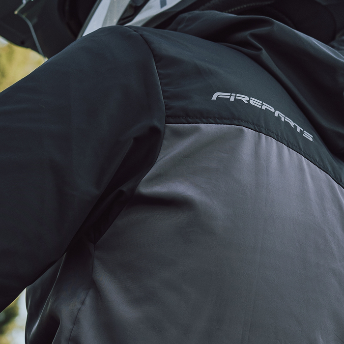 Cortavientos negro gris