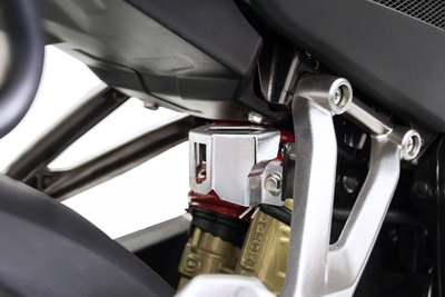 PROTEC TARRO LIQUIDO DE FRENO TRAS PULSAR 200 NS Y DOMINAR 400 Protector Tarro Liquido de Frenos Pulsar 200 NS
