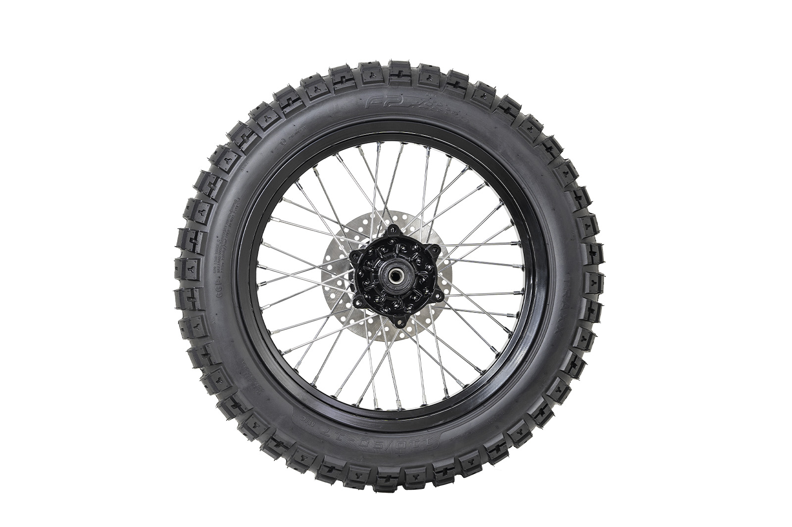 FP Traxx 110/90-17 TL en terreno irregular