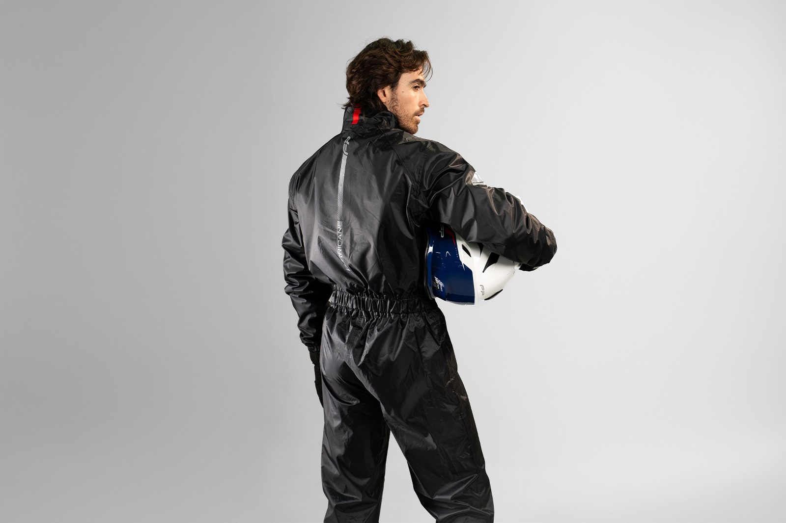 espalda del monotraje Hurricane con reflectivos