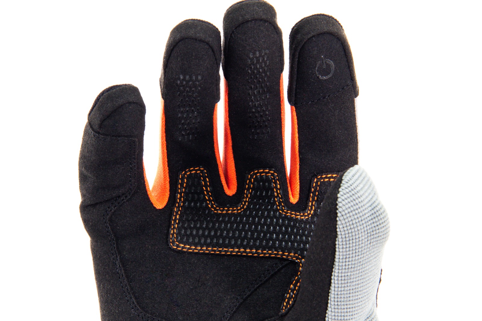 Detalle de palma de guantes Core negros con detalles naranja para moto, material antideslizante y resistente